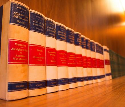law books||gavel||legal consultation desk#|#Reference law books beside a gavel#|#legal-research-library.jpg