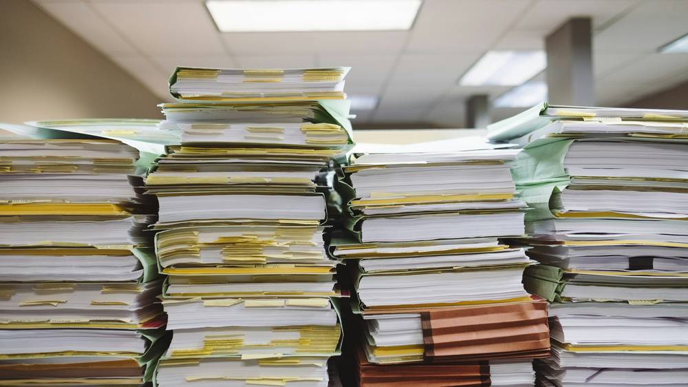 Manitoba collision paperwork neatly organized on a desk