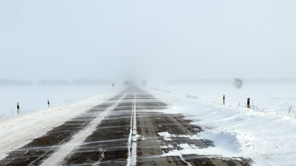 A late-night single-vehicle collision on an icy Manitoba road showing front-end damage