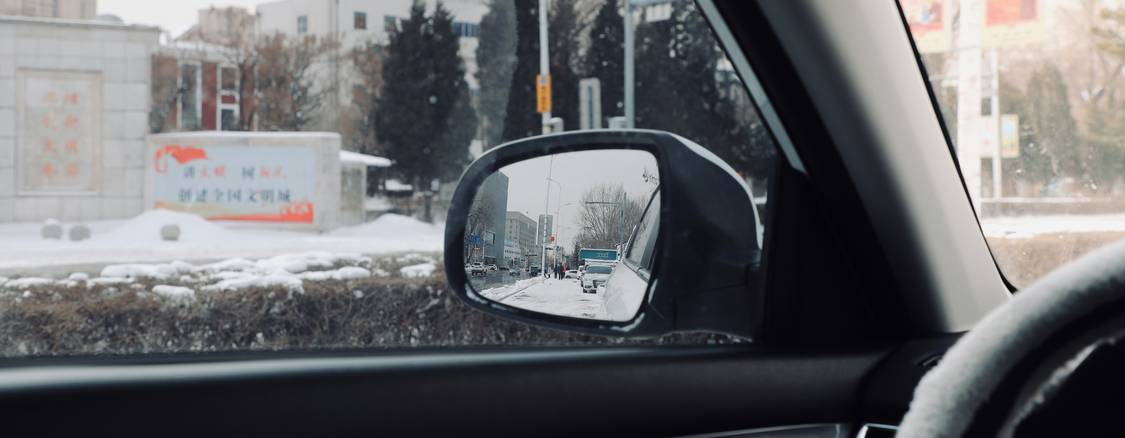 Driver exchanging information after a fender-bender on a Manitoba highway