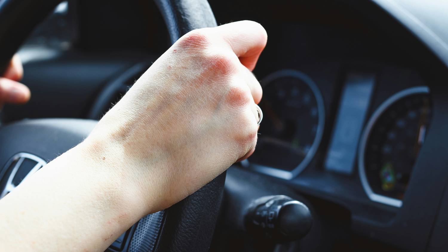 Driver in counselling session journaling recovery notes after a Manitoba car crash